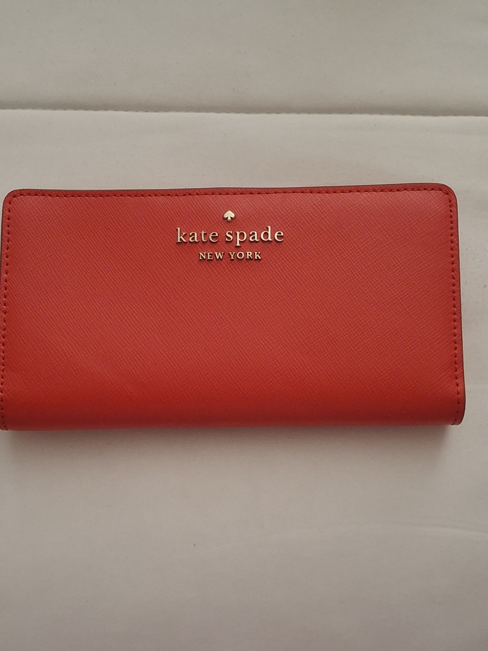 kate spade New York Red Saffiano Continental Wallet with Gold Logo
